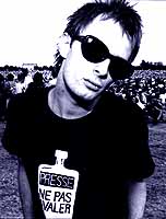 Early 1990s. Punk roots. Featuring his famous t-shirt "Presse : Ne Pas Avaler" ("The Press: Do Not Swallow" in French)