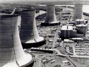 Three Mile Island Nuclear Generating Station consists of two  each with its own  and cooling towers. TMI-2, which suffered a partial , is in the foreground.