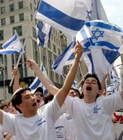  students proudly parade, in  NY, with  which have a Star of David at the center