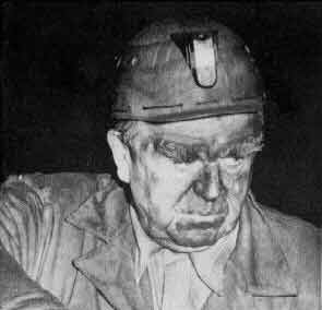 Lewis emerging from the Orient No. 2 mine in  after viewing the devastation of a mine explosion that killed 119 miners in December 
