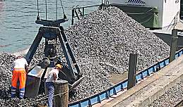 Gravel being unloaded from a 