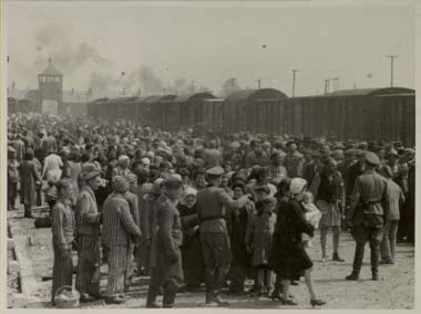 Selection at the Birkenau ramp, 1944 — Birkenau main entrance visible in the background