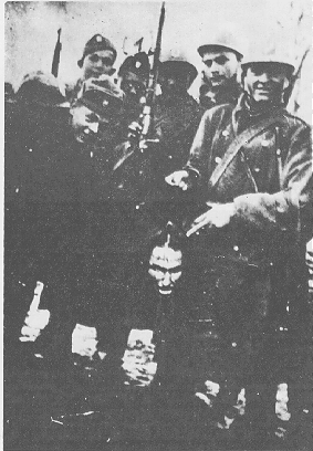 Ustaše with the head of a Serb Orthodox priestDrakulići, Feb 7, 1942