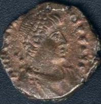 Bronze coin bearing the profile of Honorius