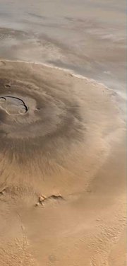 Olympus Mons (, "") is the tallest known  in our , located on the  .