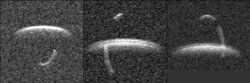 Radar images of asteroid 1999 KW4 and its moon. The 'streaks' on the image are the moon's trail as it moved while the images were created.