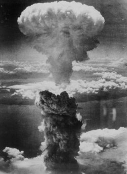 The mushroom cloud resulting from the nuclear explosion over Nagasaki rises 18 km (60,000 ft) into the air.