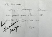 A note from   to , who then wrote "Let Freedom Reign!" at the occasion of the handover of power to the interim government. The note featured prominently in the U.S. media. Some commentators find that the new government's rule contradicts the reign of freedom.