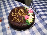 A birthday cake with writing on it