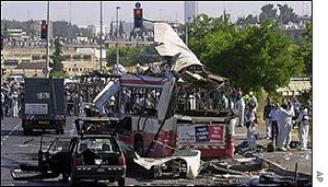 The wreckage of a commuter bus in West Jerusalem after a suicide bombing on Tuesday, 18 June, 2002. The blast killed 20 people.