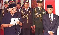 On  , after enormous political pressure and numerous demonstrations, the revolutionaries gained their prize: Suharto announces his resignation on Indonesian TV