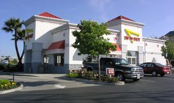In-N-Out restaurant in . Note that this particular restaurant has one drive-thru lane and an indoor dining area.