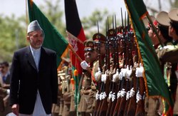 President Karzai reviews the first soldiers of the Afghan National Army.