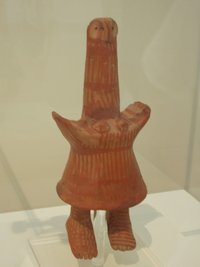 An archaic ceramic  of  Glaukopis ("owl-faced" Athena) in the National Archaeological Museum, Athens, was used as the mascot for the . The image's phallic head is not unique, but passed without comment during the Games. For the 2004 Olympics, the image was identified as a "doll" in the heavily Greek Orthodox public culture of the modern nation— then paired with Phoebus Apollo as brother and sister!! See entry 