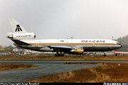 XA-MEX, a Mexicana DC-10 at Benito Jurez International Airport, 1985, with Aeromxico DC-9 on background. Courtesy of, and copyrighted by, Mr. Jorge Rocafort