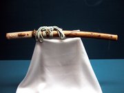 A Edo era . The tsukamaki (handle lacing) is off, showing the shark skin. Note the decoration of the saya.