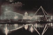 The Nashville and Memphis pavilions at night, seen over Watauga Lake, with the Commerce Building at rear.