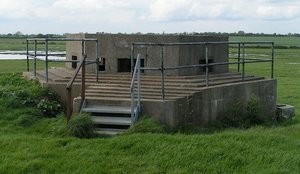 A pillbox on the East coast of England.  Part of the defences build during World War II (the railings are a modern addition)