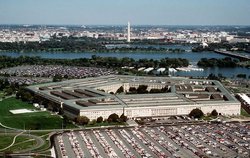A pre-9/11 view of The Pentagon, looking east with the Potomac River and  in the distance. South Parking is in the foreground; the Heliport side where  struck it is on the left.