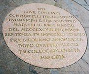 A plaque commemorates the site of Savonarola's execution in the Piazza della Signoria, Florence.