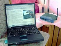 The notebook is connected to the wireless access point using a PCMCIA wireless card.