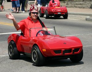 A member of the Syrian Corvettes group of Shriners participates in a Memorial Day parade