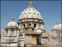 The dome designed by Michelangelo was completed by Giacomo della Porta in 1590.