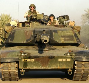 The US  tank is a typical modern main battle tank.  The  is low-profile, well-integrated into the overall shape of the vehicle.