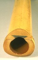 A shakuhachi, showing its utaguchi (blowing edge) and inlay 