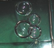 Submerged antibubbles of air surrounding soapy water