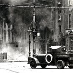 A Rolls Royce armoured car in action in street fighting on 's  during the 