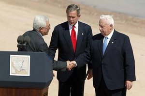 ,  President George W. Bush, and  Prime Minister  after reading statement to the press during the closing moments of the Red Sea Summit in , , , 