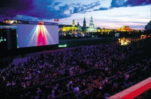 Summer open-air cinema by the Elbe; in the background, Brhl’s Terrace, the Hofkirche and the Opera.