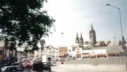 A street in Truro, with Truro Cathedral in the background.