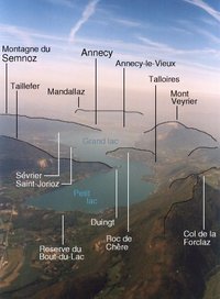 Lake Annecy showing towns and mountains (c)Didier Halatre