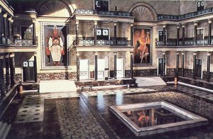 A reconstruction of the main hall of the Museum of Alexandria used in the series  by . The wall portraits show  (left) and .