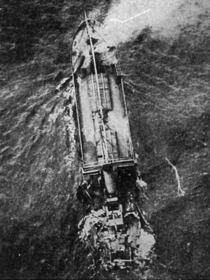 The British steamer Andex sinking after being torpedoed by a U-boat.