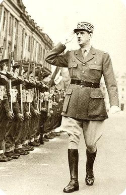 General de Gaulle reviewing troops.