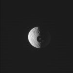 Mimas, imaged by Cassini, looking notably egg-shaped