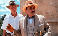 Several crime fiction books have become movies as did 's  ().  Here, David Suchet (foreground) plays Poirot in the film.