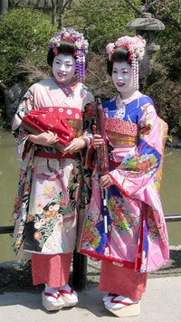 Women dressed in kimono as maiko (apprentice ).