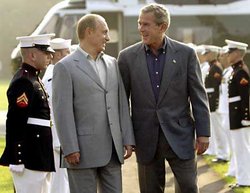 Vladimir Putin with U.S. President George W. Bush.