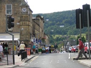 Otley on a market day, looking down Kirkgate with The Chevin in the background