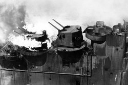 Aft 5-inch gun turrets on fire, March 1945