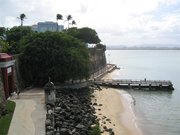Back portion of La Fortaleza, San Juan's wall and sea-side gates to the city.