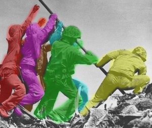 (/)A photo colorized to show all six men -  (red),  (violet),  (green),  (Yellow),  (brown),  (teal)
