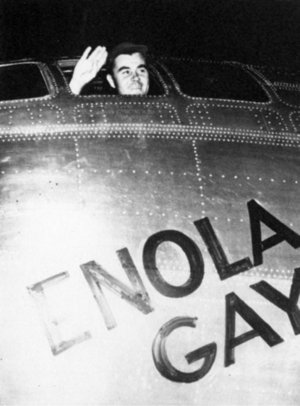 Colonel Paul Tibbets waving from the Enola Gay's cockpit