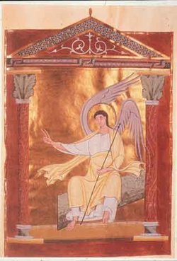 Folio 117r of the Pericopes of Henry II, Reichenau, c. 1002 - 1012: the Angel on the Tomb.  The facing folio, 116v, contains an illumination of the three Maries aproaching the tomb.
