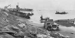 "Unloading on the beach of Iwo Jima"