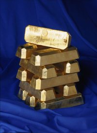 Gold ingots like these, from the , form the base of many monetary systems.